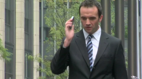 Busienss man with smart phone Stock Footage