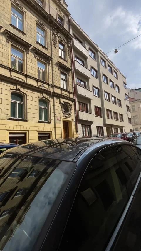 Busier urban perspective featuring timeless architecture and tranquil mood Stock Footage 335436381