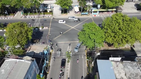 The busiest traffic light intersection in Banjarmasin, the intersection ent.. Stock Footage 314786419