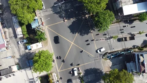 The busiest traffic light intersection in Banjarmasin, the intersection ent.. Stock Footage 314786738