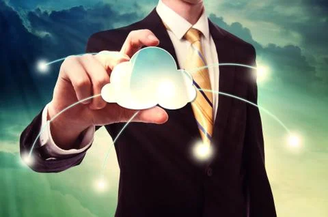 Businesman holding cloud computing icon Stock Photos