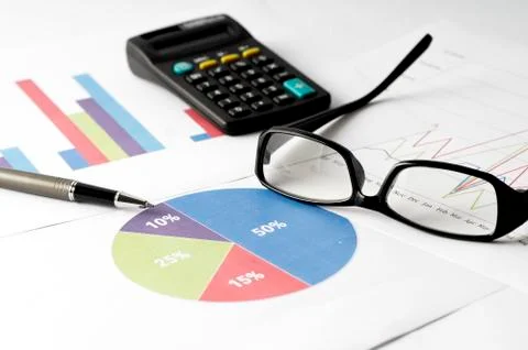 Business Analysis report with graph chart, glass and calculator for annual re Stock Photos