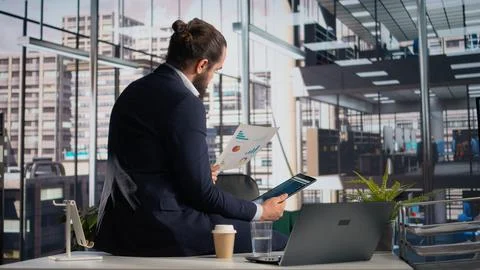 Business analysis, tablet and documents, KPIs for evaluation and decision making Stock Photos