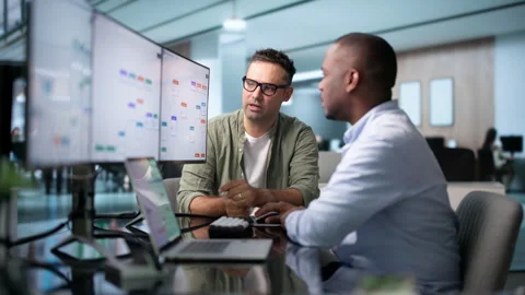 Business Analyst And Engineer Optimizing Automated Workflow Stock Footage 346927184