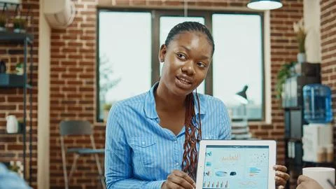 Business analyst explaining statistics Stock Photos