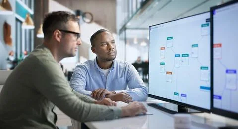 Business Analyst Explains Robotic Process Automation For Improving Workflow E Stock Photos