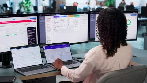 Business Analyst Monitors Real-time Software Dashboard Ensuring Operational Stock Footage 339188295