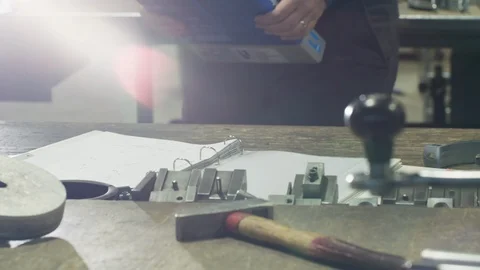 A Business Analyst Opening a Folder and Checking the Numbers with Lensflare 스톡 동영상 118550686