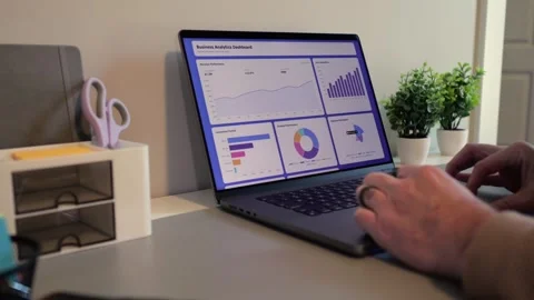 Business Analyst Sorting Through Graphs ... | Stock Video | Pond5