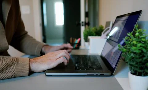 Business Analyst Sorting Through Graphs and Charts Stock Photos