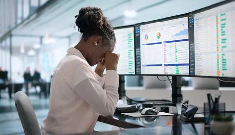 Business Analyst Squints At Screen, Rubbing Tired Eyes From Coding Strain. Stock-Fotos