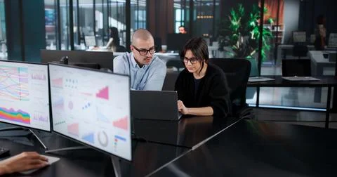 Business Analyst Team Is Analyzing High Performance Data On Multiple Computer Stock Photos