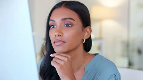 Business analyst thinking, reading or analysing data on computer to predict Stock Footage 201907369