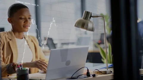 Business analyst typing on laptop and activating hologram chart, studying data Stock Footage 334694352