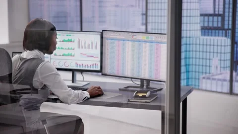Business Analyst Working with Data on Stock Spreadsheet Stock Footage 257909749