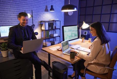 Business analysts working at table in office. Data science concept Stock Photos