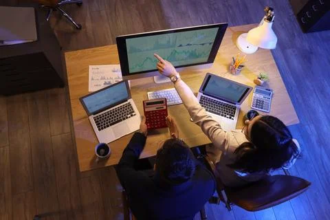 Business analysts working at table in office, top view. Data science concept Stock Photos