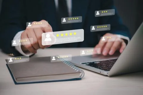 Business analyzing virtual customer feedback, digital star rating managemen.. Foto stock