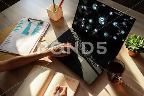 Business and manufacturing process automation concept on device screen. Stock Photos