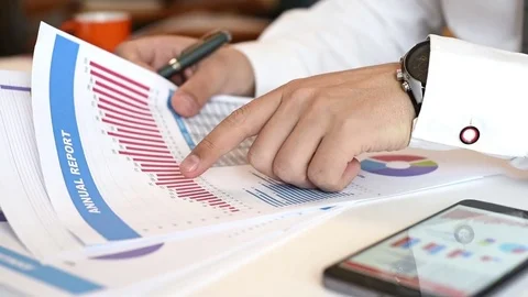 Business Broker Analyzing Stock Data Stock Footage 74550139