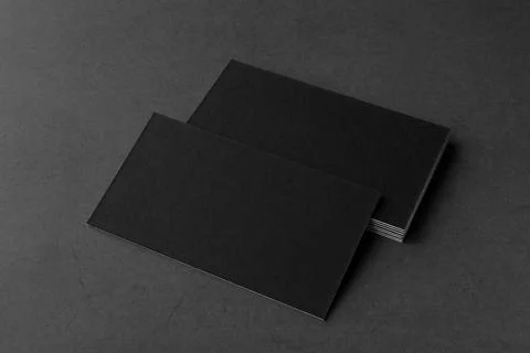 Business card on black background. Stock Photos