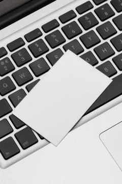 Business card on computer Stock Photos