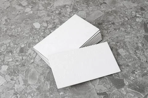 Business card on gray background. Stock Photos