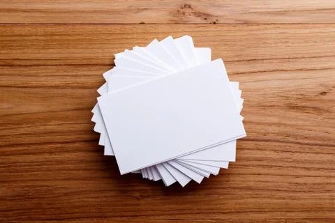 Business card stack blank mockup on wood desk Stock Photos