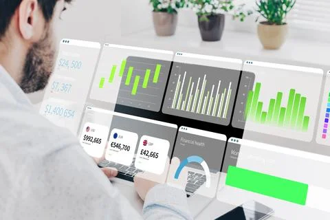 Business chart displayed on computer screen while a man analyzes data in Stock Photos