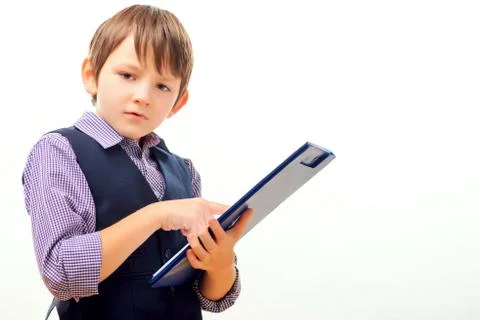 Business child in suit and tie posing with a clipboard Stock Photos