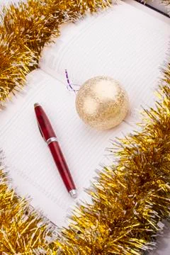 Business Christmas of a balls, pen, diary, tinsel Stock Photos