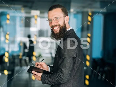 Business coach career training man notebook pen Stock Photos