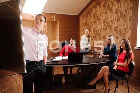 Business coach holding training for staff Stock Photos