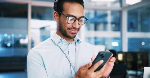 Business, coding and man in office, smartphone and software developer with Stock Photos