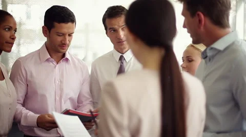 Business colleagues collaborating on group project Stock Footage 63278335