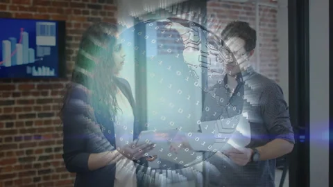 Business colleagues conversing while rotating globe showing bar charts on tablet Stock Footage 312715245