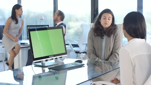 Business colleagues green screen computer on desk, having a discussion in office Stock Footage 108213982