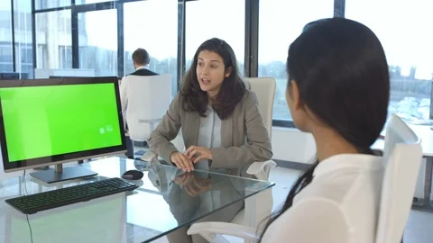 Business colleagues green screen computer on desk, having a discussion in office Stock Footage 108214760