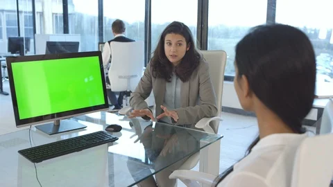 Business colleagues green screen computer on desk, having a discussion in office Stock Footage 108215360