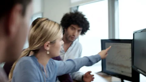Business colleagues using computer at office. Stock Footage 63524663