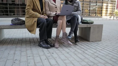 Business colleagues using a laptop while discussing new business projects Video stock 192317542