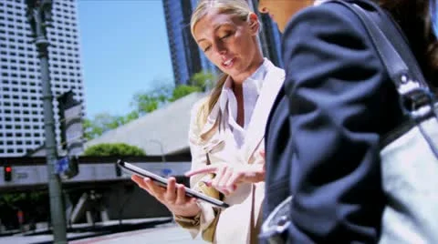 Business colleagues using wireless internet Stock Footage