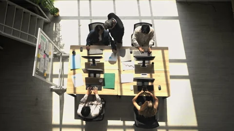 Business colleagues working together at computers Stock Footage 339062074