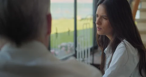 Business colleges having a coffee break, talking to each other. Slow motion,  Stock Footage 146202096