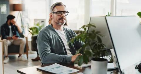 Business, computer and programming with man in creative workplace for web design Foto stock