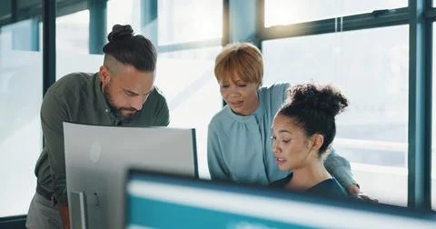 Business, computer or team talking, planning or online schedule in office 写真素材