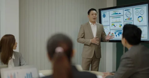Business concept of 4k Resolution. Asian business man making a presentation.. Stock Footage 334970232