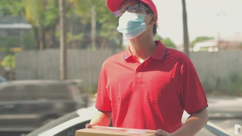 Business concept of 4k Resolution. The courier is delivering the package to t Stock Footage 155288323