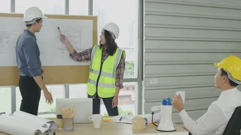 Business concept of 4k Resolution. Engineers are meeting together in the offi Stock Footage 144700909