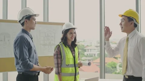 Business concept of 4k Resolution. Engineers are working together to plan the Stock Footage 146616334